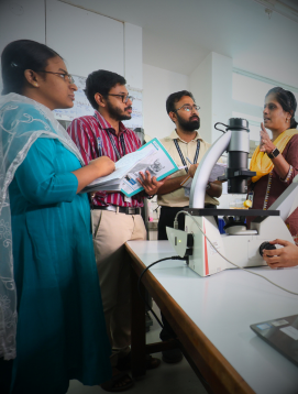 A teaching session around laboratory equipment at CMC Vellore