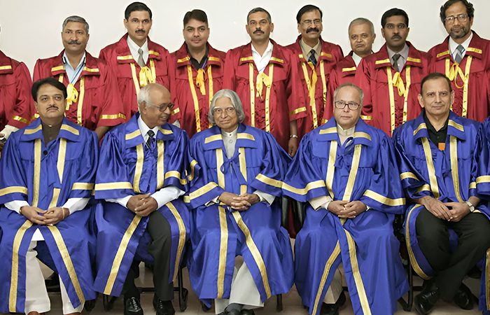 Faculty and dignitaries in ceremonial robes at a DIAT convocation