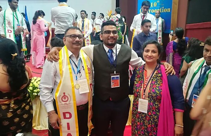 Graduands and families in the convocation hall at DIAT, Girinagar