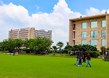 Students on the central lawn at Galgotias University, Greater Noida