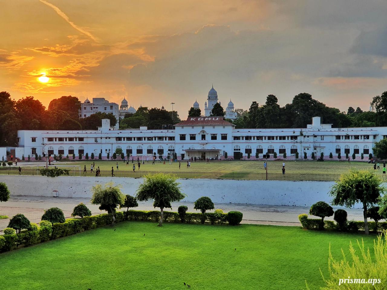 The KGMU grounds and heritage skyline at dusk