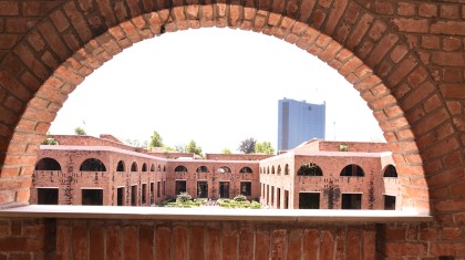 The red-brick arched courtyard of the MDI Gurgaon campus