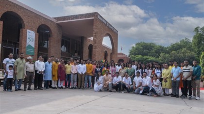 Students and staff in front of the main academic block at MDI Gurgaon