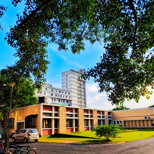 A hall-of-residence tower amid the greenery of the NIT Rourkela campus
