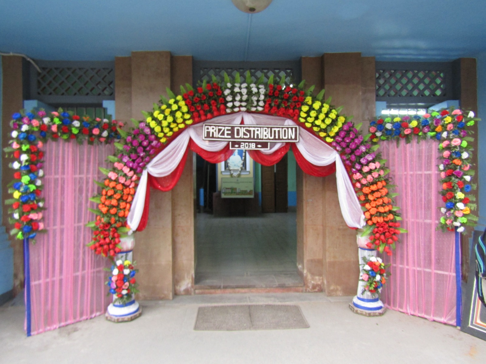 Decorated entrance of the Rahara campus during a prize distribution ceremony
