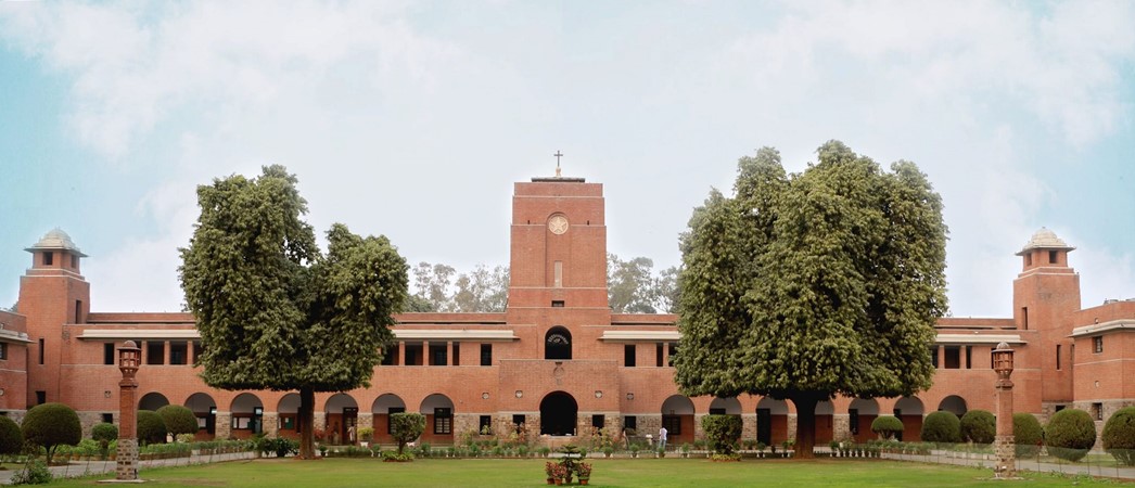 The red-brick main block and clock tower at St. Stephen's College, Delhi